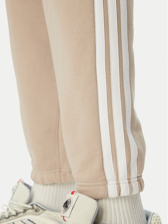 adidas adidas Долнище анцуг Essentials 3-Stripes French Terry Tapered Cuffed KY4196 Бежов Regular Fit