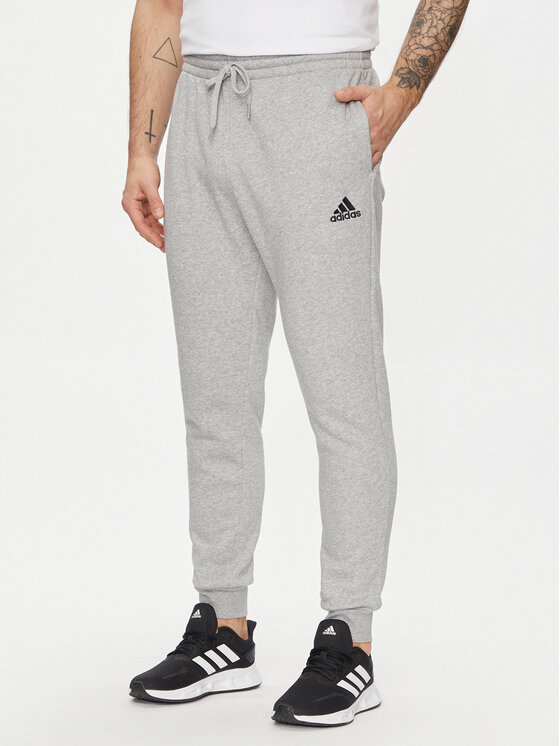 adidas Teplákové nohavice Essentials Fleece HL2230 Sivá Regular Fit