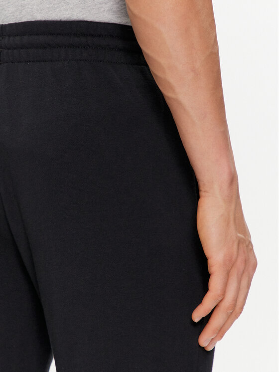 adidas adidas Sporta bikses Essentials French Terry Tapered Cuff Logo Joggers IC0063 Melns Regular Fit