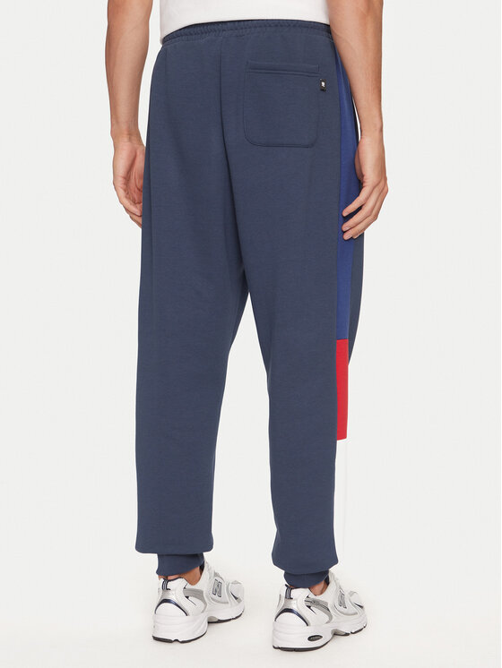 New Balance New Balance Spodnji del trenirke MP43522NNY Modra Relaxed Fit