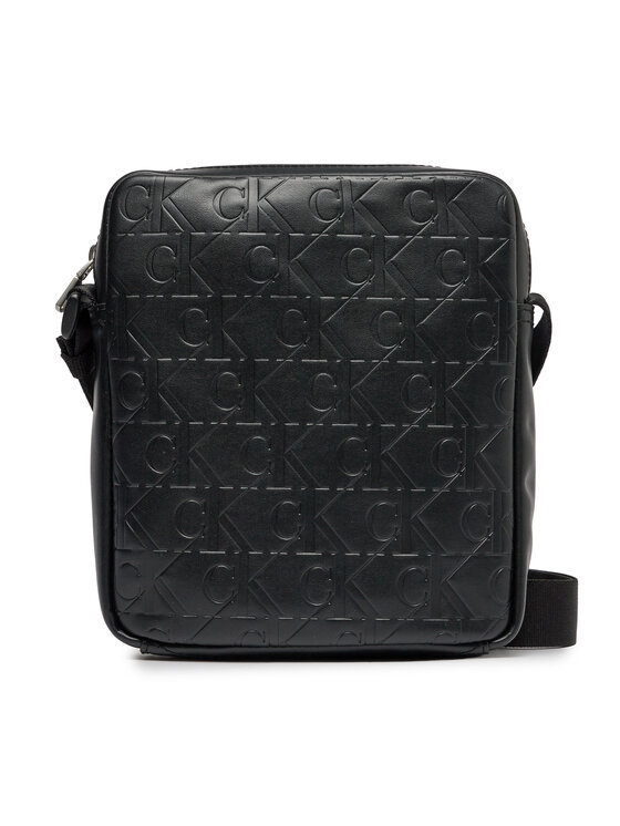 Geantă crossover Calvin Klein Monogram Soft Reporter 18 Aop K50K511495 Negru