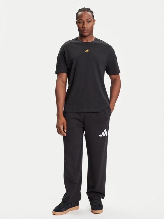 adidas adidas Spodnie dresowe Essentials JF3567 Czarny Loose Fit