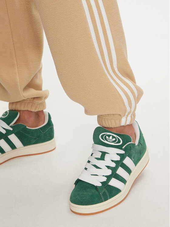 adidas adidas Spodnie dresowe adicolor 3-Stripes IZ2490 Beżowy Regular Fit