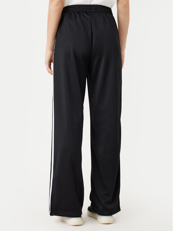 adidas adidas Pantaloni da tuta adicolor Classic Firebird JC8245 Nero Loose Fit