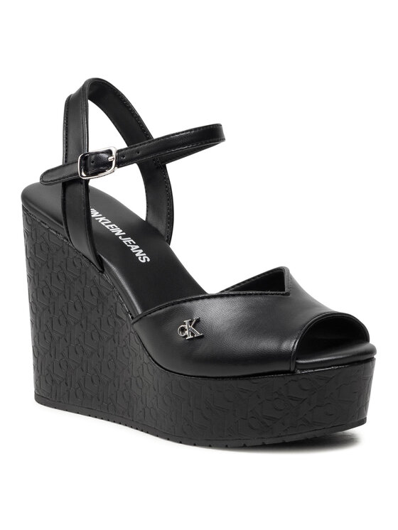 Calvin Klein Jeans Calvin Klein Jeans Sandali Wedge Sandal Ankle Aop Pa-Pl YW0YW00033 Črna