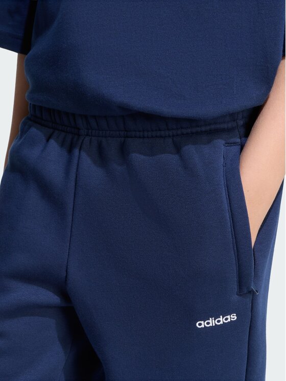 adidas adidas Spodnie materiałowe 159172 Niebieski jasny Loose Fit