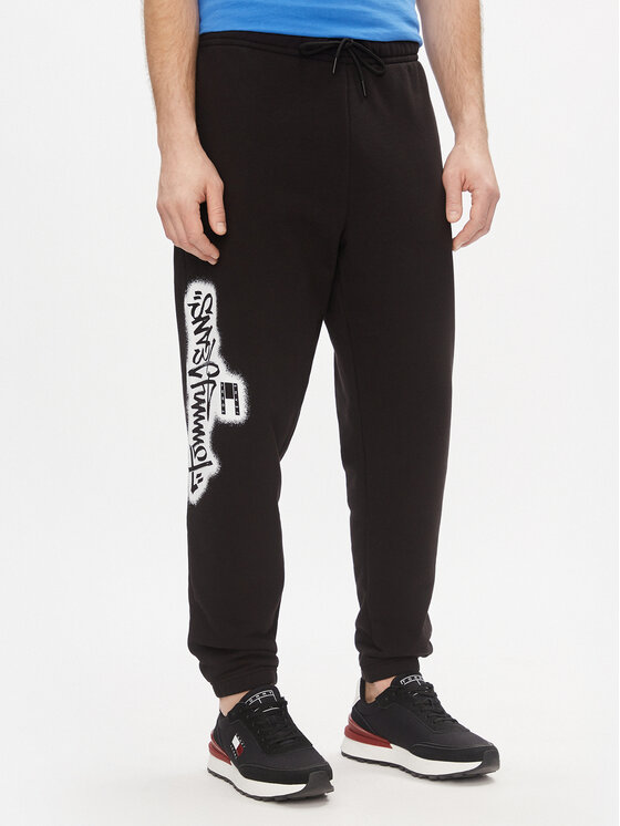 Tommy Jeans Tommy Jeans Donji dio trenerke Tjm Reg Tommy Spray Sweatpant DM0DM18376 Crna Regular Fit