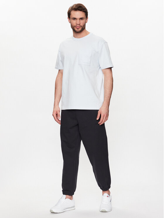 New Balance New Balance Spodnie dresowe MP23551 Czarny Relaxed Fit