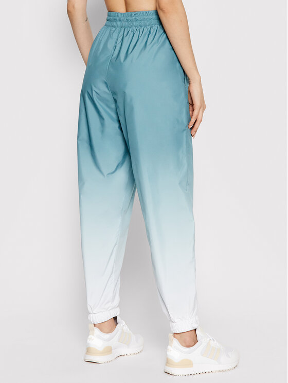 adidas Pantaloni da tuta adicolor 3D Trefoil GN2850 Verde Loose Fit Modivo