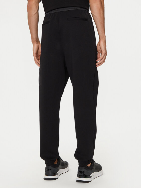 Armani Exchange Armani Exchange Spodnji del trenirke XM000084 AF10818 UC001 Črna Regular Fit