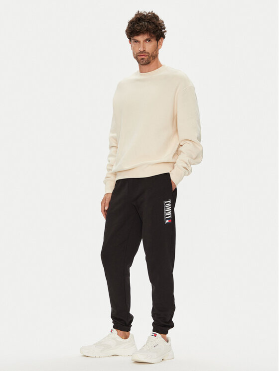 Tommy Jeans Tommy Jeans Spodnji del trenirke Dna Graphic DM0DM22145 Črna Slim Fit