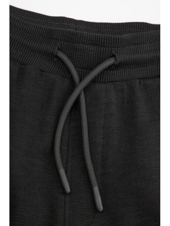 Coccodrillo Coccodrillo Spodnie dresowe ZC4120103VBA-021 Czarny Regular Fit