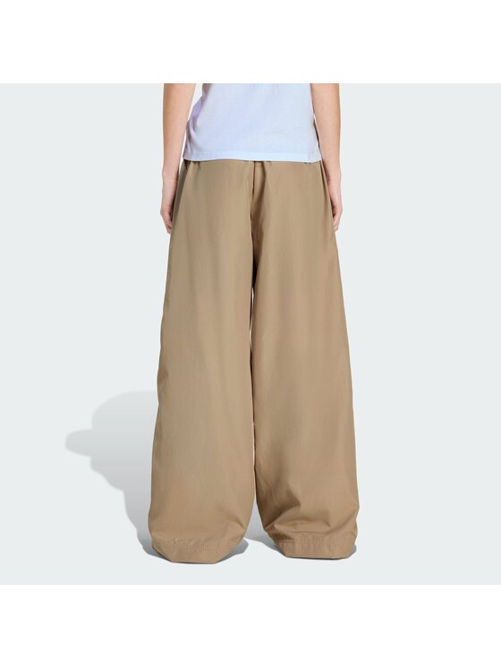 adidas adidas Pantaloni da tuta Firebird Adilenium KD6300 Beige Regular Fit