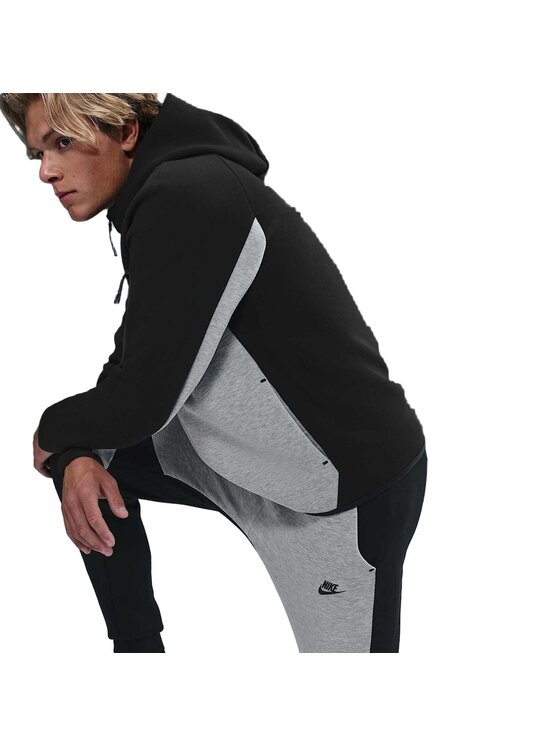 Nike Nike Spodnie dresowe M NRG NOCTA TCH FLC OH PANT HV0959-011 Czarny Regular Fit