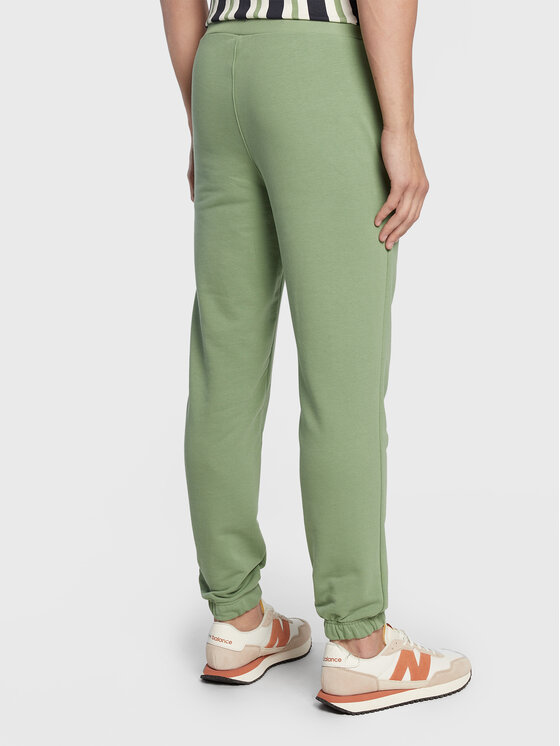 New Era New Era Spodnji del trenirke Essential 60284702 Zelena Relaxed Fit