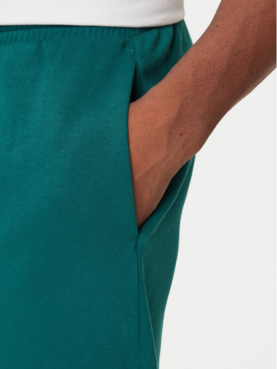 adidas adidas Spodnji del trenirke Collegiate JM9178 Zelena Regular Fit