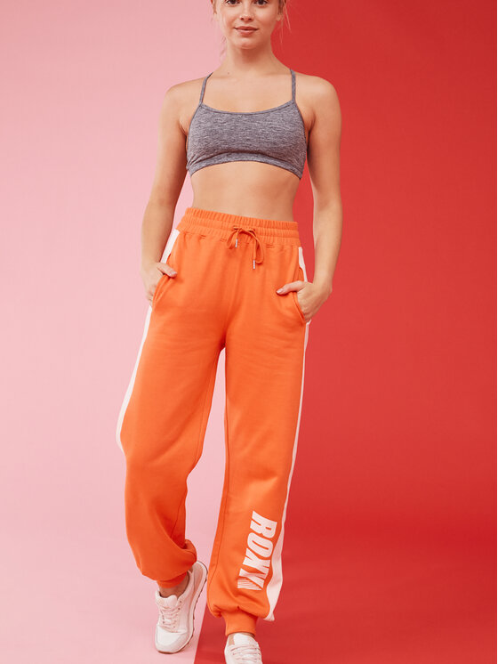 Roxy Roxy Spodnie dresowe Ess Nrj Cbk Jog Otlr ERJFB03366 Pomarańczowy Regular Fit