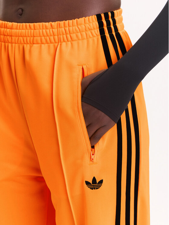 adidas adidas Долнище анцуг adicolor Classic Firebird JY2694 Жълт Loose Fit