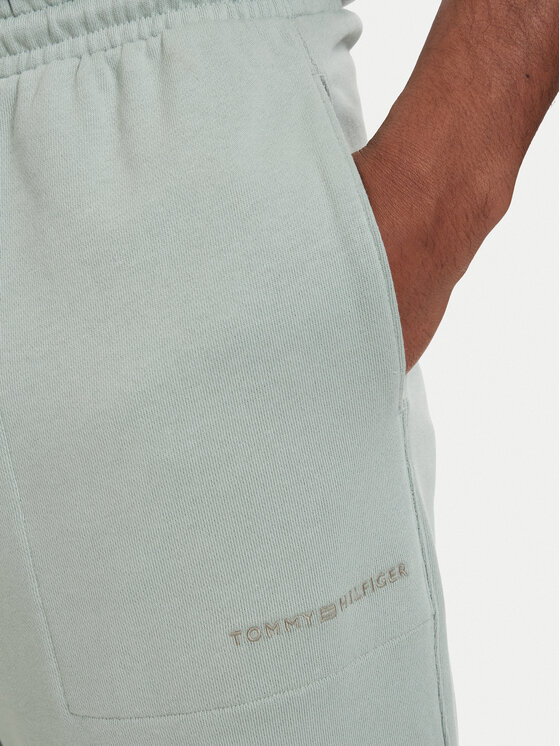 Tommy Hilfiger Tommy Hilfiger Spodnji del trenirke Essential UM0UM03911 Svetlo zelena Relaxed Fit