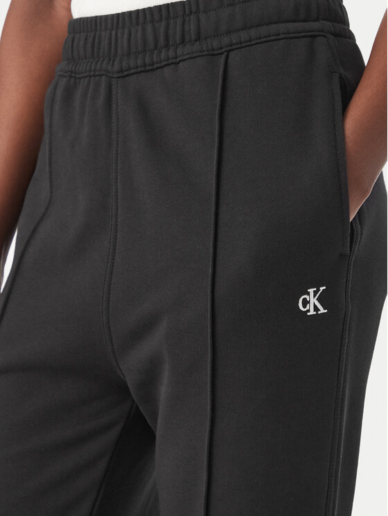 Calvin Klein Jeans Calvin Klein Jeans Spodnie dresowe Monogram LV047H220G Czarny Flare Fit