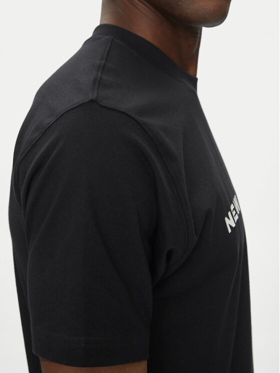 New Balance New Balance T-Shirt Reimagined Graphic MT51506 Černá Relaxed Fit