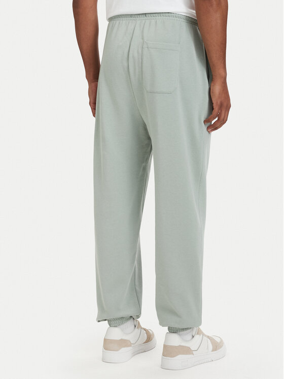 Tommy Hilfiger Tommy Hilfiger Долнище анцуг Essential UM0UM03911 Светлозелен Relaxed Fit