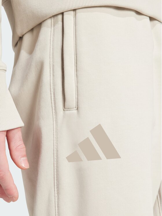 adidas adidas Spodnie dresowe 147249 Beżowy Loose Fit
