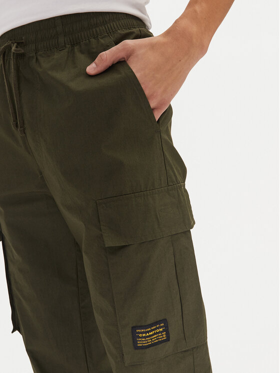 Champion Champion Spodnji del trenirke 220415 Zelena Loose Fit
