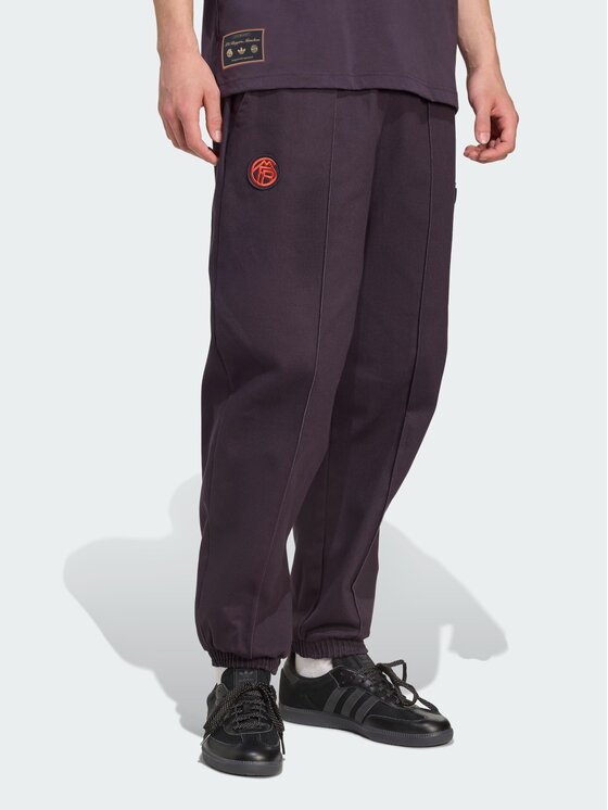 adidas adidas Spodnie materiałowe 157293 Fioletowy Loose Fit