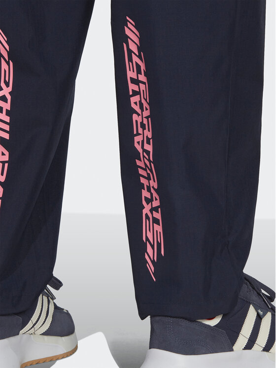 adidas adidas Spodnie dresowe Adventure Ride HK4979 Granatowy Loose Fit