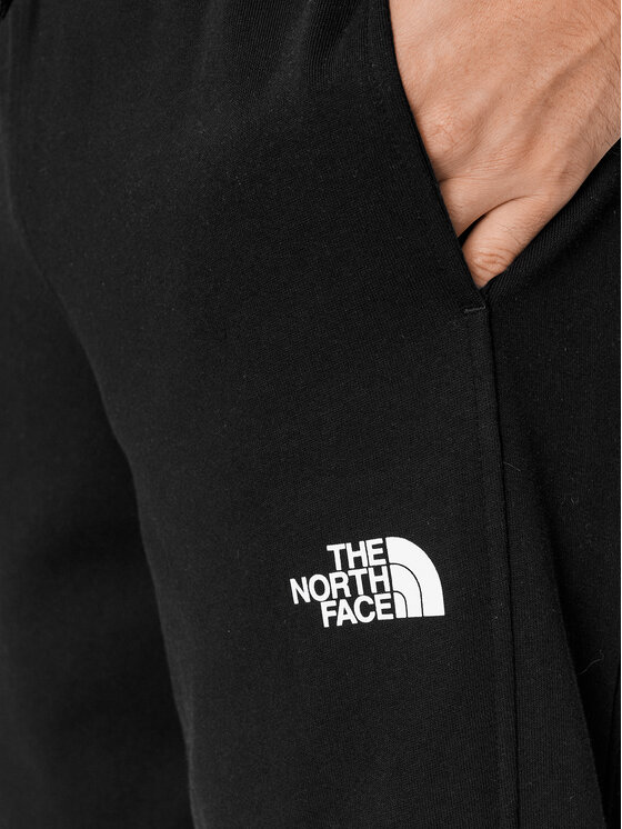 The North Face The North Face Долнище анцуг Standard NF0A4M7L Черен Regular Fit