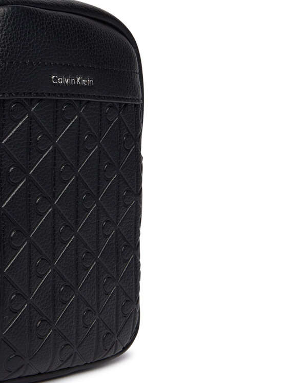 Calvin Klein Calvin Klein Somiņa Emblem Aop Emboss Slim Reporter LV04D3228G Melns
