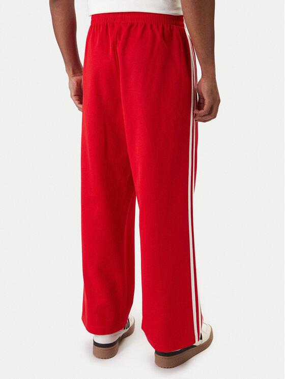 adidas adidas Donji dio trenerke adicolor KE3498 Crvena Loose Fit