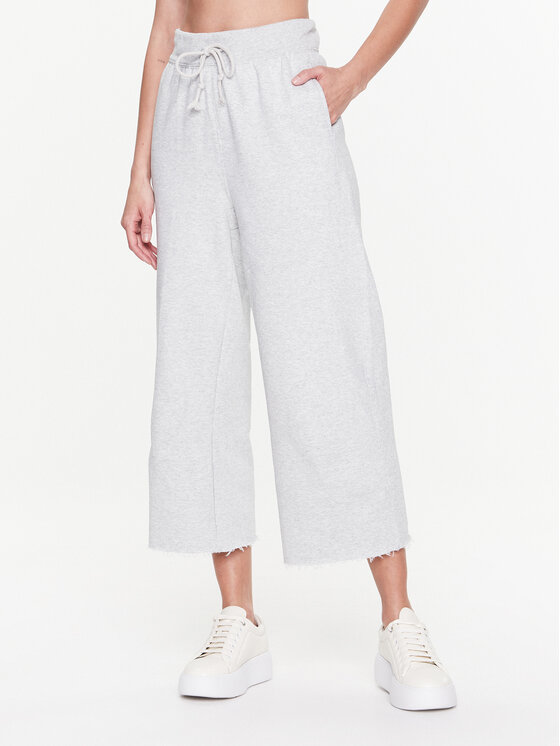 Calvin Klein Performance Pantaloni trening 00GWS3P608 Gri Relaxed Fit