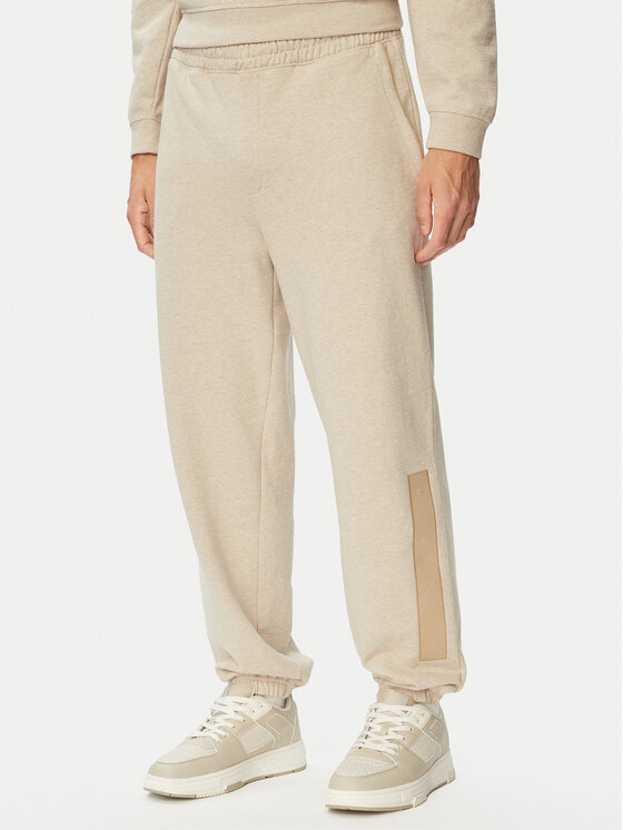 HUGO Pantaloni trening Dalipant 50563100 Bej Relaxed Fit