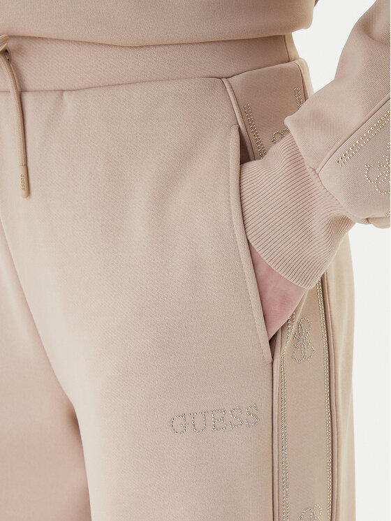 Guess Guess Spodnie dresowe V5BB12 KCX22 Beżowy Regular Fit