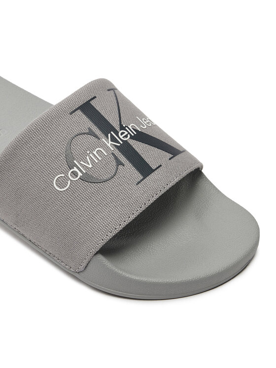 Calvin Klein Jeans Calvin Klein Jeans Klapki Slide Monogram Co YM0YM00061 Szary