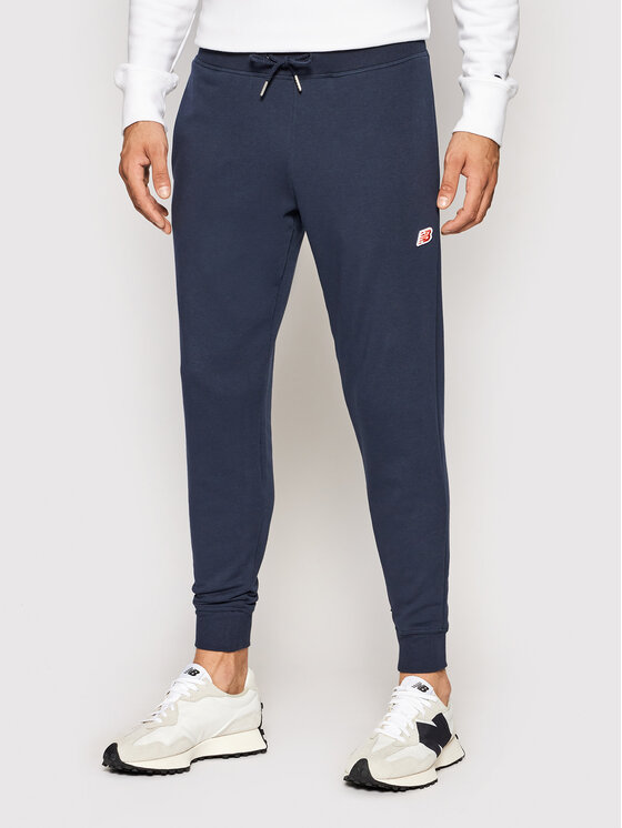 New Balance Pantaloni da tuta MP01664 Blu scuro Regular Fit • Modivo.it