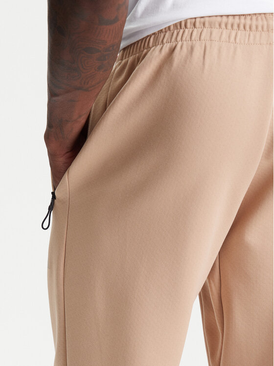 adidas adidas Donji dio trenerke Z.N.E. JW4725 Bež Loose Fit