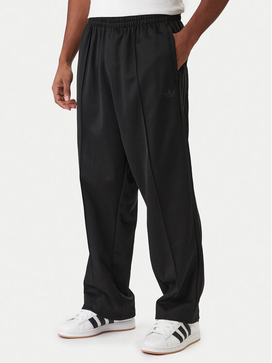 adidas adidas Pantaloni trening adicolor KE3500 Negru Loose Fit