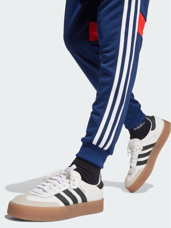adidas adidas Spodnie materiałowe Tiro Niebieski jasny Regular Fit