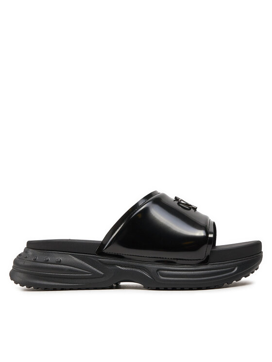 Calvin Klein Jeans Mules / sandales de bain Chunky Comf Slide Mtr YW0YW01506 Noir