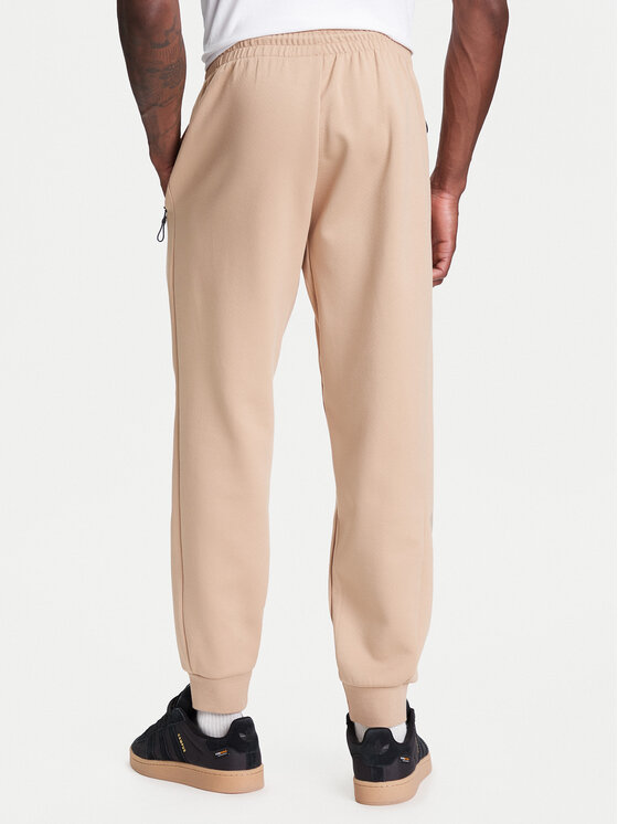 adidas adidas Spodnie dresowe Z.N.E. JW4725 Beżowy Loose Fit