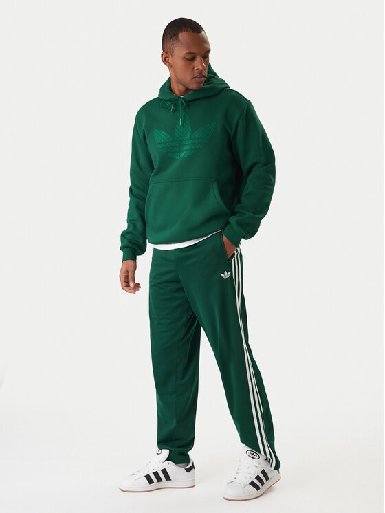 adidas adidas Spodnie dresowe Firebird KD8317 Zielony Loose Fit