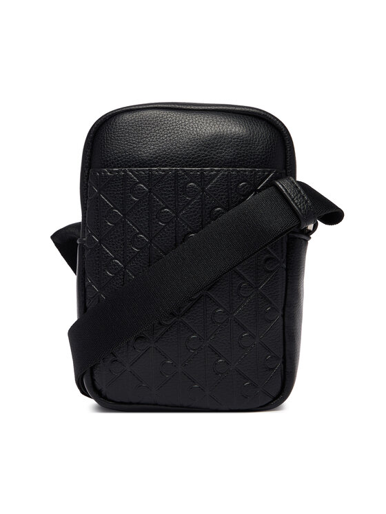 Calvin Klein Calvin Klein Torbica za okrog pasu Emblem Aop Emboss Slim Reporter LV04D3228G Črna