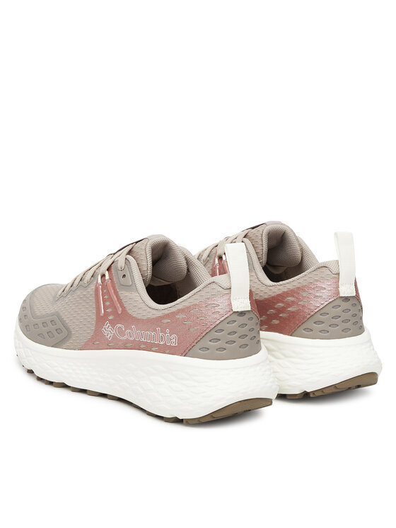 Buty sportowe pokazane pod kątem od tyłu, widoczna pięta i podeszwa.