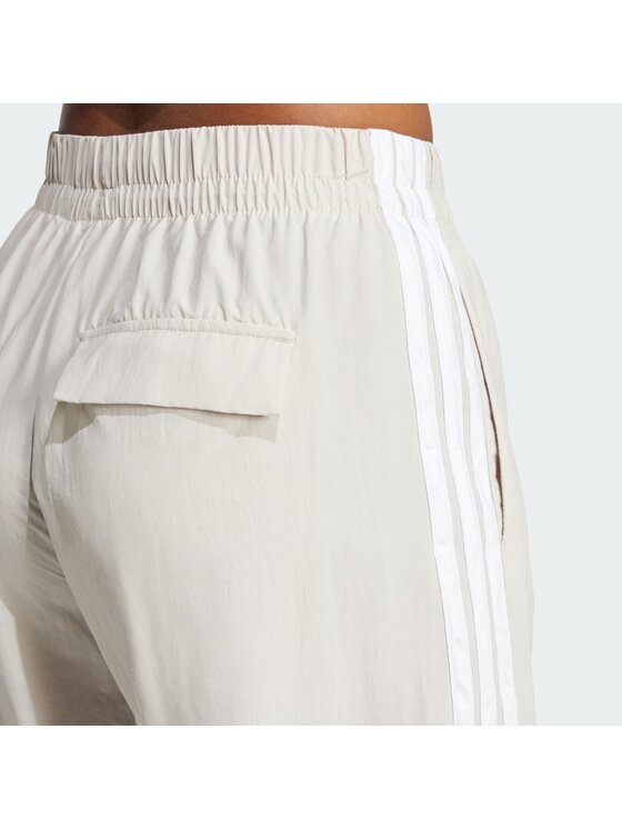 adidas adidas Donji dio trenerke Essentials 3-Stripes JC8168 Bež Loose Fit