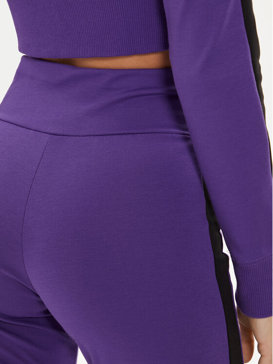 Puma Puma Spodnji del trenirke DUA LIPA 536629 Vijolična Slim Fit
