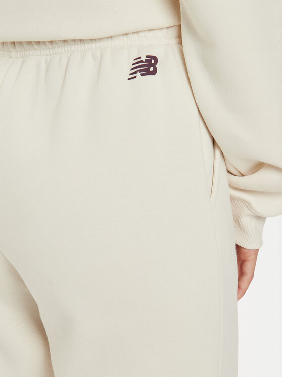 New Balance New Balance Pantaloni trening WP43500 Bej Relaxed Fit