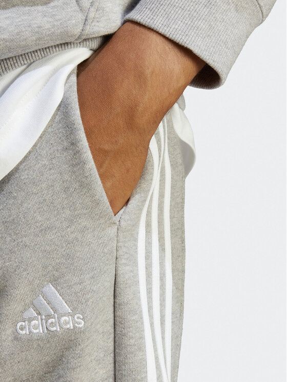 adidas adidas Spodnie dresowe Essentials French Terry Tapered Cuff 3-Stripes Joggers IC9407 Szary Regular Fit